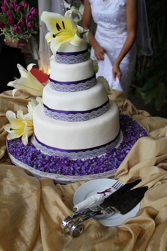 Their wedding theme was Spanishinspired purple and yellow gold