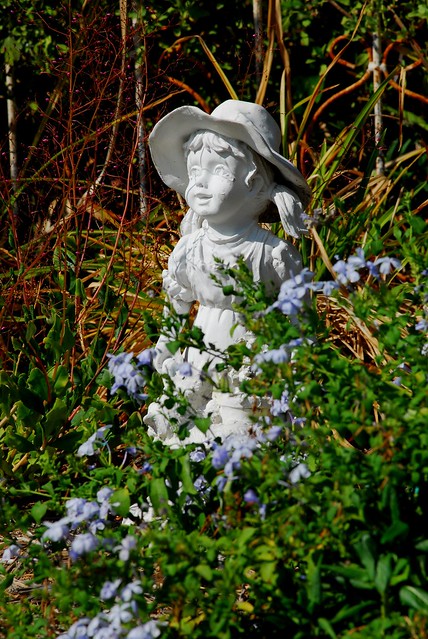 Statue and Flowers