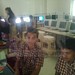 Students of 'Colors of Life' Dr.Ambedkar Memorial School working on the computers directly