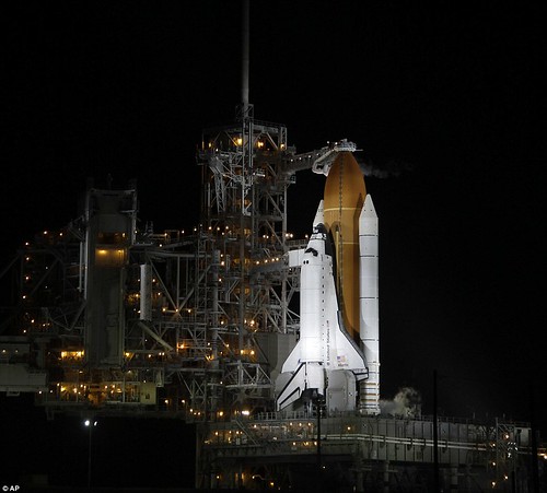 Let's light her up one last time! Atlantis overcomes a shaky launch to become the final Nasa shuttle to blast into space  18