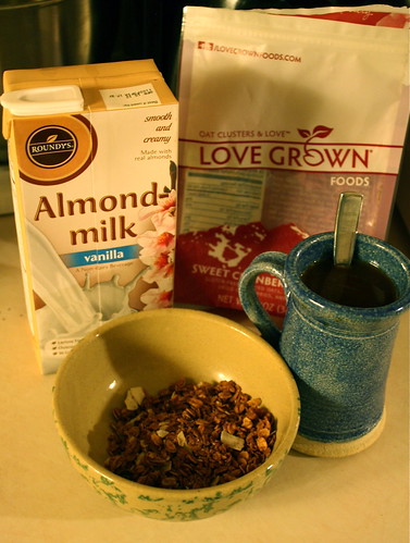almond milk, granola, Love Grown bag, coffee
