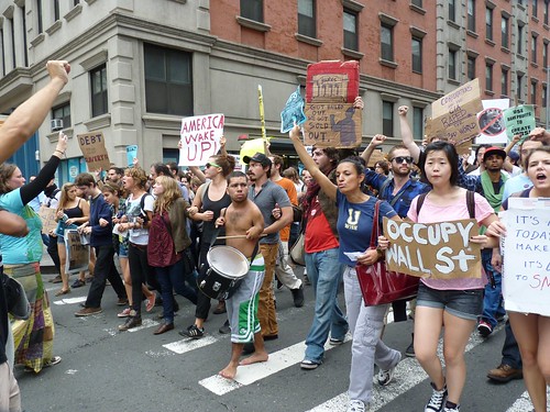 Occupy Wall Street marchers link arms, play drums on Church St
