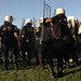 Greek riot police hit by flying beer can during Thessaloniki Trade Fair demonstrations