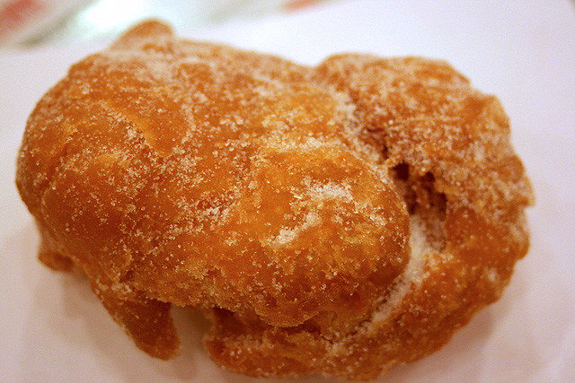 Some dough fritter coated with sugar