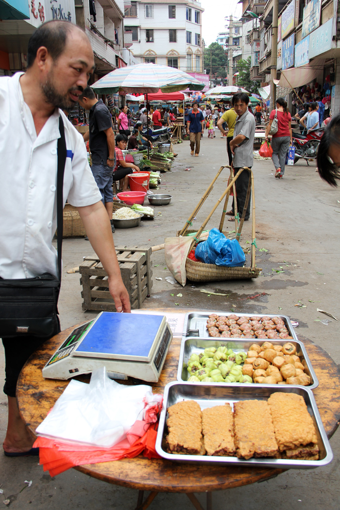 Market Seller in Sanjiang, China