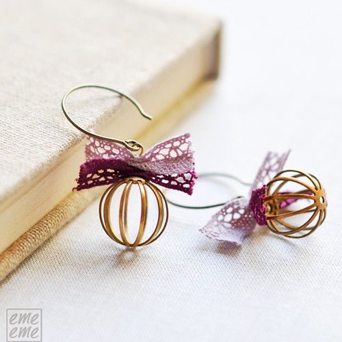 Earrings Brass bead cages and pink and 
purple lace bows