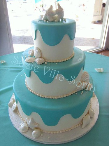 Tropical themed wedding cakes come in an array of shapes sizes and cuteness 