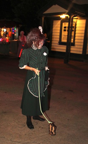 Haunted Mansion maid walking ghost dog