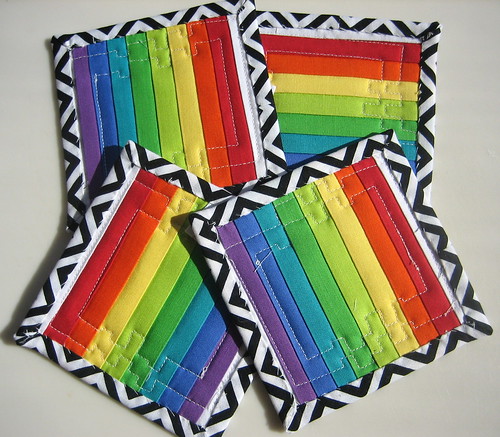 Backs of rainbow coasters