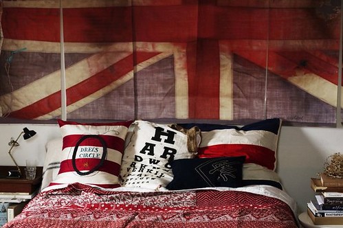 Chris Court {eclectic vintage modern bedroom using flags as art} by recent settlers