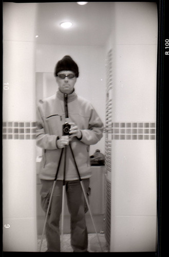 reflected self-portrait with Bilora Boy camera and pointy hat by pho-Tony