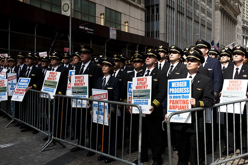 Airline pilots protest United/Continental merger on Wall Street