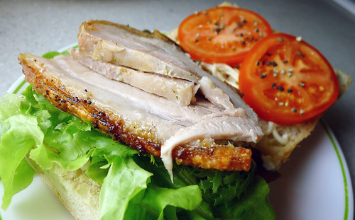 pork belly, lettuce and tomato sandwich