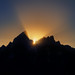 Last rays of sun behind Grand Teton Mountains