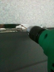 drilling to make a screw hole