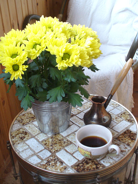 yellow chrysanthemums and coffee