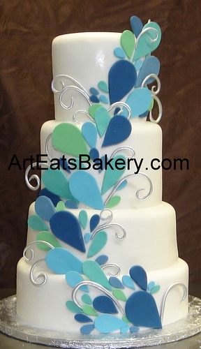  blue and teal sugar sculpture peacock four tier fondant wedding cake