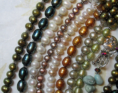 various pearl sets and a bracelet