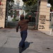 Greek protester throws bottle of paint at government building during demonstration in Thessaloniki, Greece.