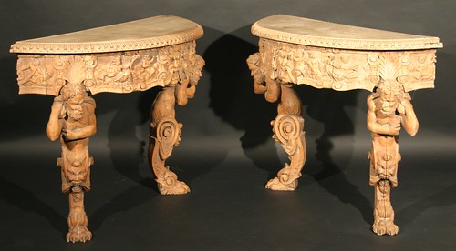 A pair of Italian 18th century walnut tables in the baroque style