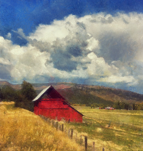 Red barn, fields and sky... Colorado roadside scene...