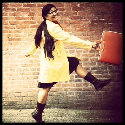 Prancing in my yellow coat and red briefcase