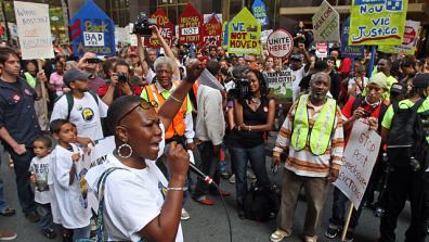 3,000 people gathered outside the Bank of America on October 1, 2011 to protest the role of financial industry in the economic crisis in the United States. The protest is connected with the Wall Street occupation in NYC. by Pan-African News Wire File Photos