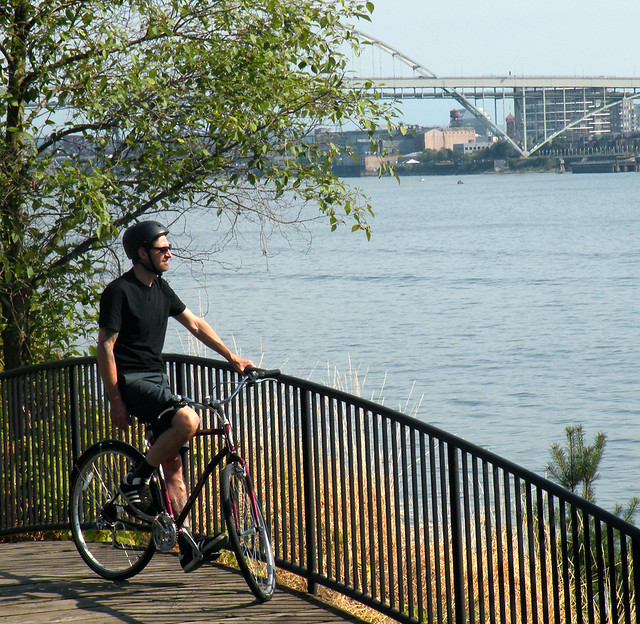 Mike Biking Along the River