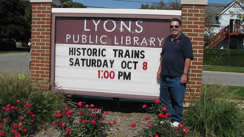 Eddie K standing by the sign at the Lyons Public Library.  Lyons Illinois USA. Saturday, October 8th, 2011. by Eddie from Chicago