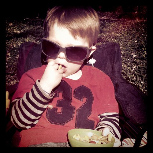 C sporting my sunglasses at the parade this afternoon. Love that kid!
