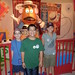 Jacob, Caleb and Sydni in front of Mr. Potato Head at Toy Story Mania in Disney's Hollywood Studios