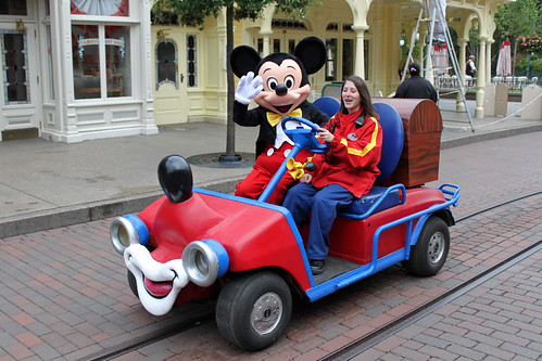 Mickey greets Guests aboard his Mickeymobile!