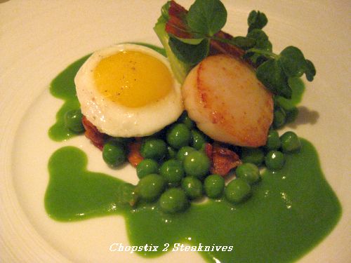 Pan fried sea scallops from the Isle of Skye with peas, crispy bacon, quail’s eggs, baby gem lettuce
