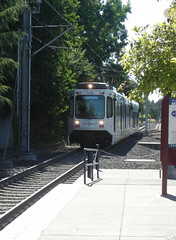 A Bombardier-BN "Type 1" car approaches the Hillsboro Airport & Fairgrounds station