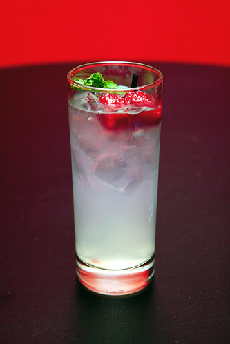 Stoli Raspberry vodka cocktail in a highball glass