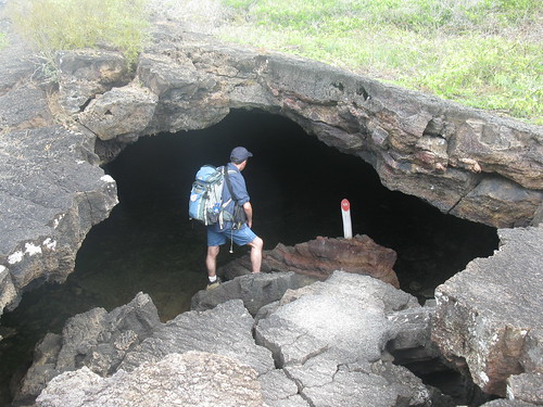Lava tube, geologist for scale