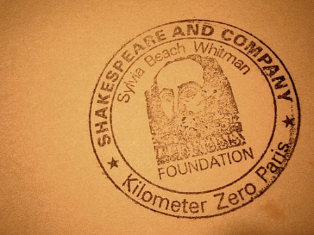 Shakespeare-and-Company-Kilometer-Zero-Paris-stamp-courtesy-Nicholas-Laughlin-at-Flickr-CC-450x337