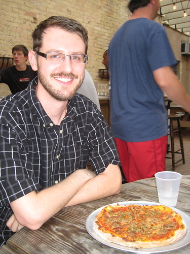 Craig with sausage pizza
