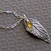  wire wrapped citrine on a fine silver leaf