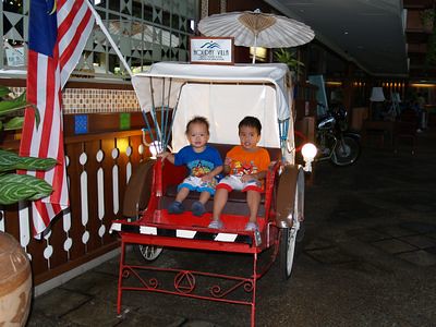 Boys on trishaw