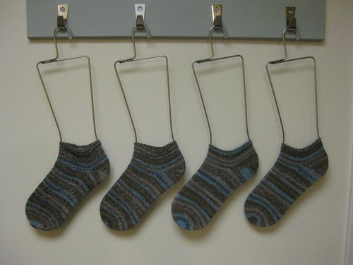 summer socks, hanging in a row