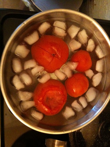 Blanching the tomatoes (this removes the skin)
