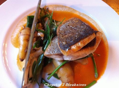 Gilthead bream with razor clams, sea vegetables, ratte potatoes and crab bisque