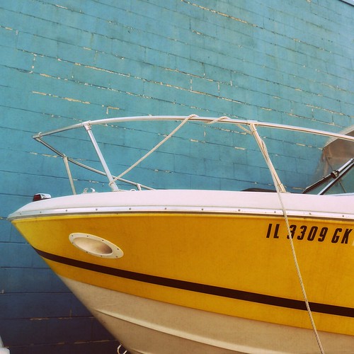Yellow Boat Blue Wall