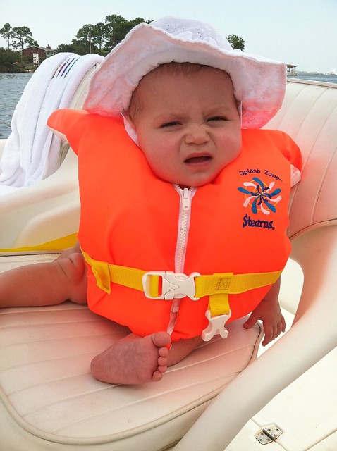 Emory wears a life vest