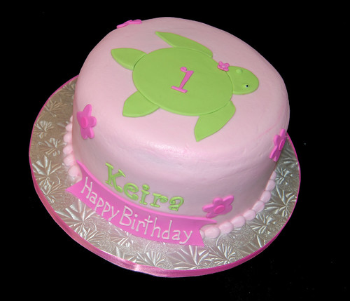 1st birthday pink and green sea turtle Hawaiian cake