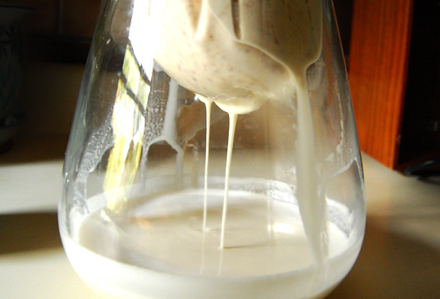 Straining almond milk