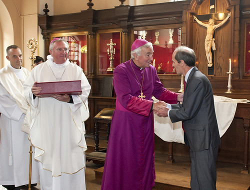 CTS General Secretary Mr Fergal Martin presents the Missal to the archbishop of Westminster Vincent Nichols earlier this year