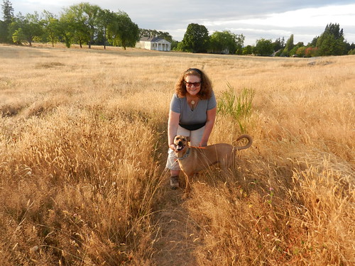 All smiles and happiness - Linda Lane and Rosie (Rose Alice Lane), field of golden grass, old building, sacred land, trees, Discovery Park, Seattle, Washington, USA, photo by Nick Boseck by Wonderlane