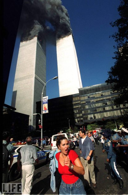 A woman running from 9/11 scene